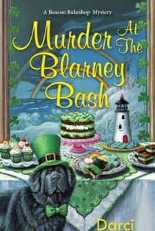 
Lindsey is baking up a storm—shamrock sugar cookies, Guinness chocolate cupcakes, Irish soda bread—for the well-timed grand opening of the Irish import gift shop, the Blarney Stone, owned by her boyfriend’s uncle, Finnigan O’Connor, recently relocated from the Emerald Isle.
But it’s Uncle Finn himself who seems full of blarney when he gleefully reveals a pot of real gold he claims he stole from an actual leprechaun. And Finn’s fortune takes a turn for the worse when he’s arrested for the bludgeoning of a small unidentified man dressed as a leprechaun—the murder weapon alleged to be his now-missing shillelagh.
Eccentric Uncle Finn may enjoy believing he’s outwitted a leprechaun, but he would never be so deluded as to clobber one with his walking stick. Now Lindsey will need more th
